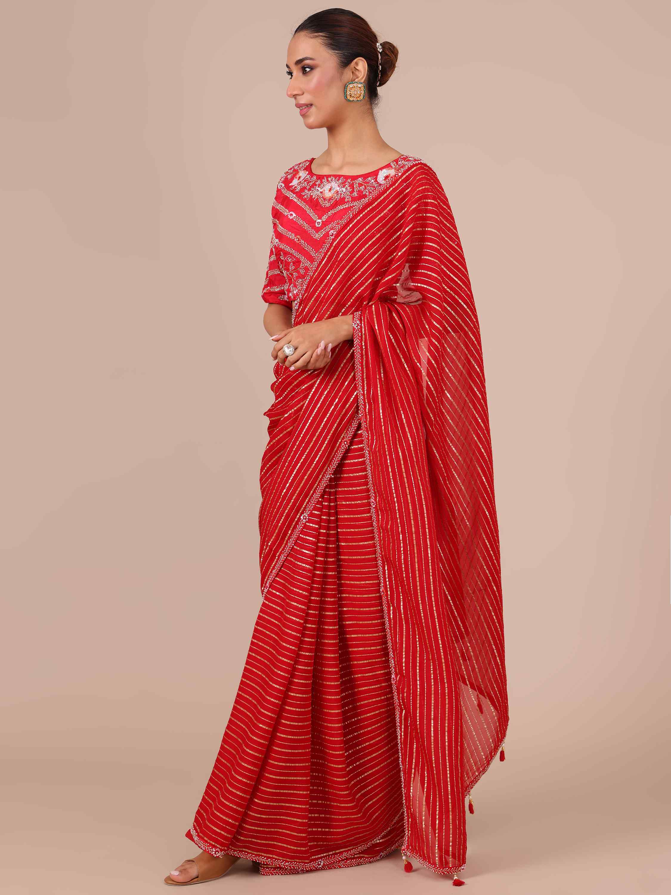 Rani Color Organza Saree with Stitched Silk Blouse