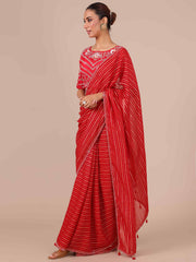 Rani Color Organza Saree with Stitched Silk Blouse