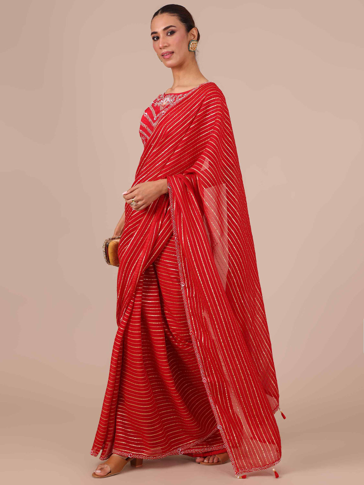 Rani Color Organza Saree with Stitched Silk Blouse