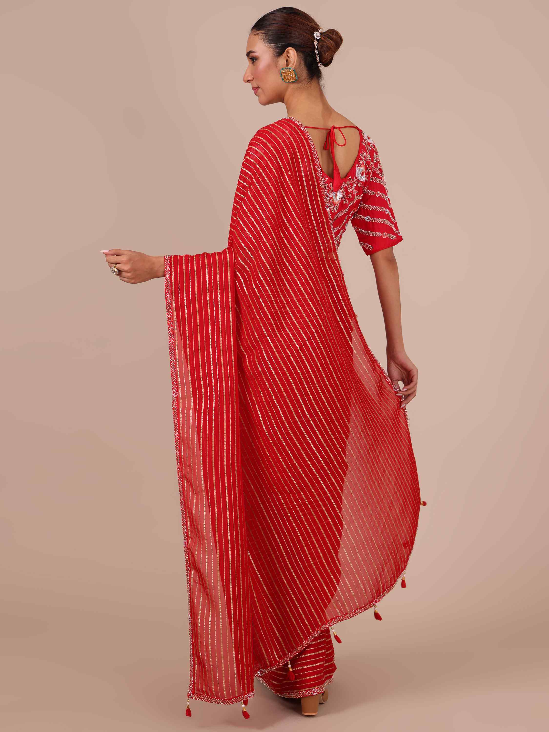 Rani Color Organza Saree with Stitched Silk Blouse