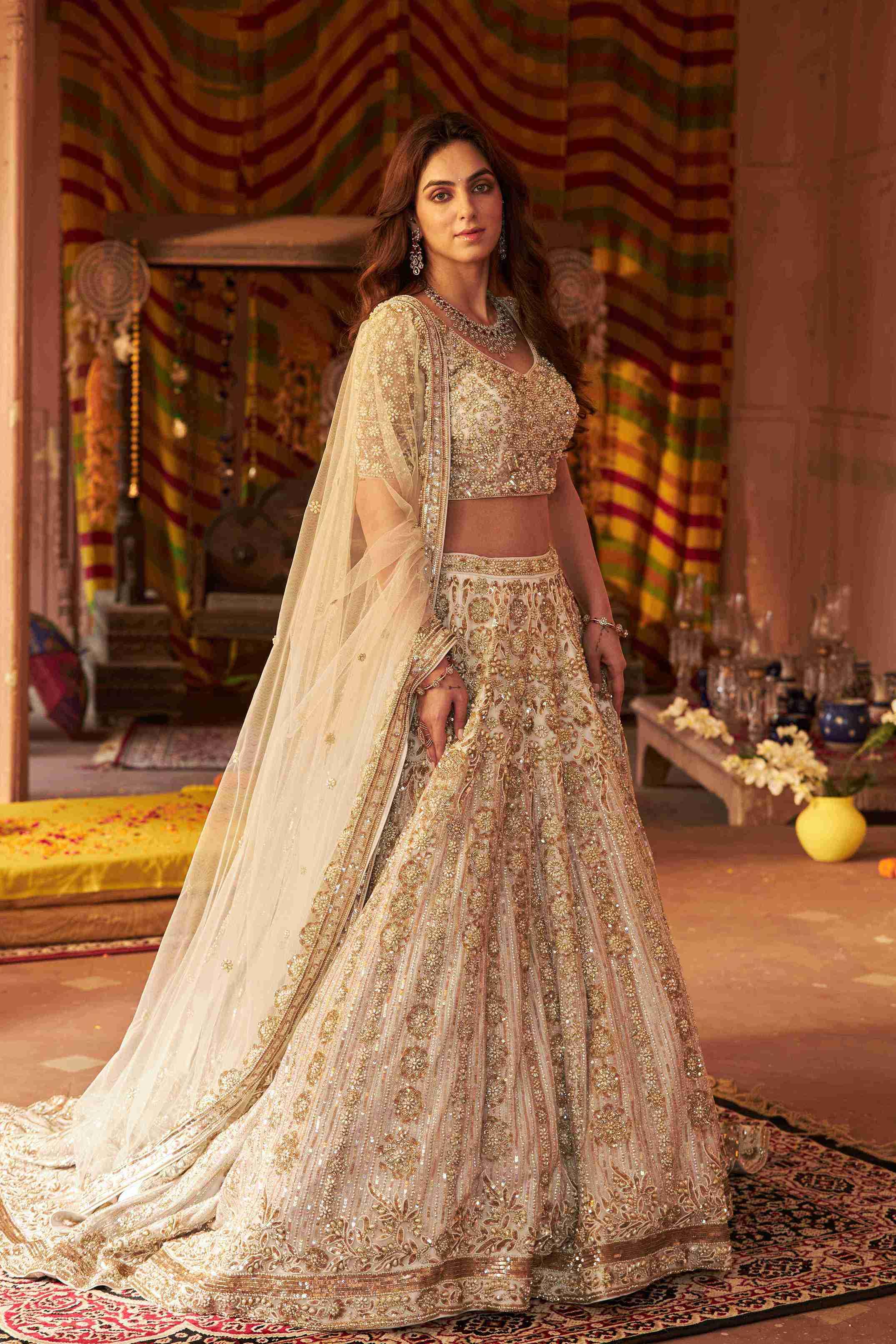 Ivory Lehenga Choli with Pearls, Sequins and Cut Dana Work