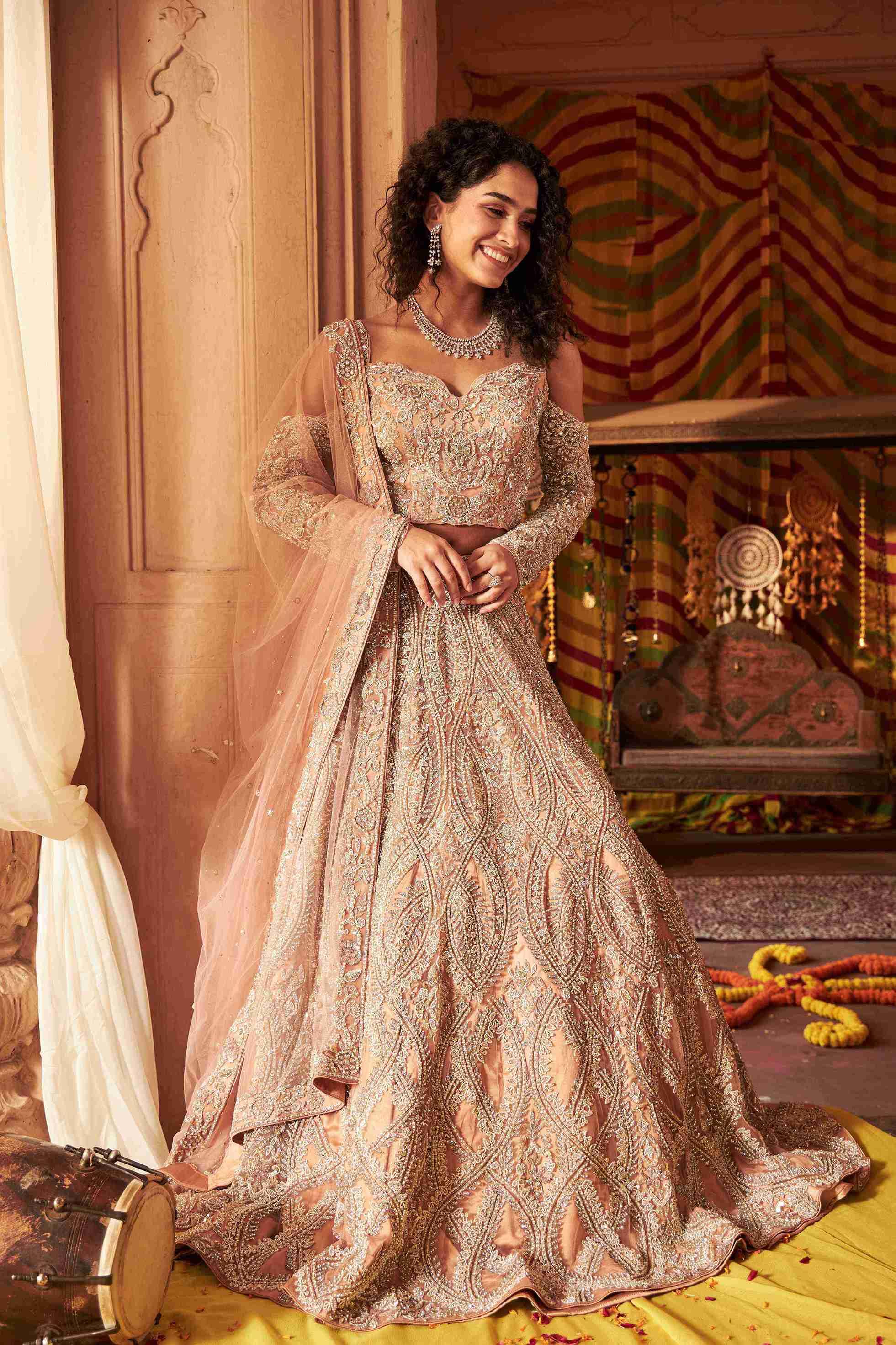 Peach Bridal Lehenga Choli with Poth Pearls and Cutdana Work House of Surya