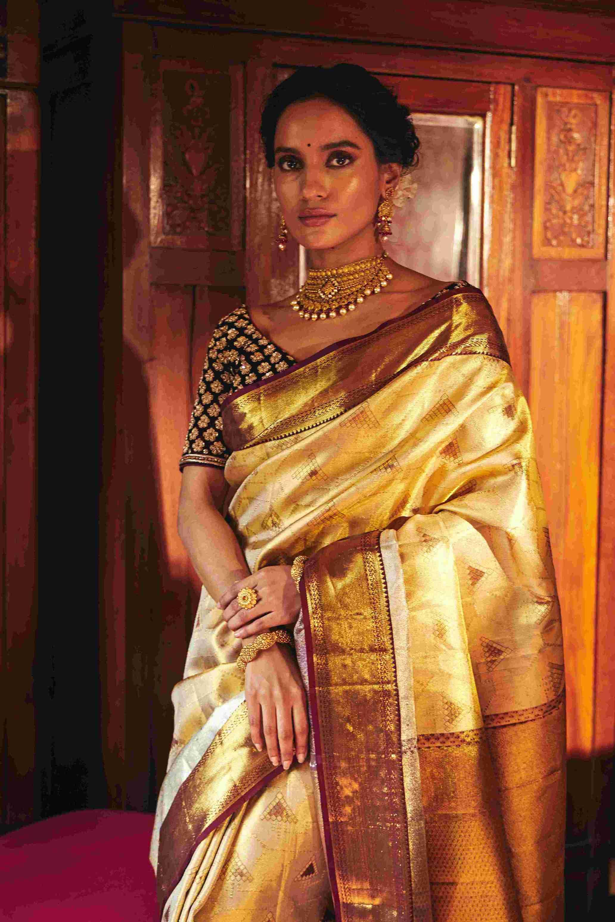 Pure Kanjivaram Silk saree with golden and Silver zari weaving