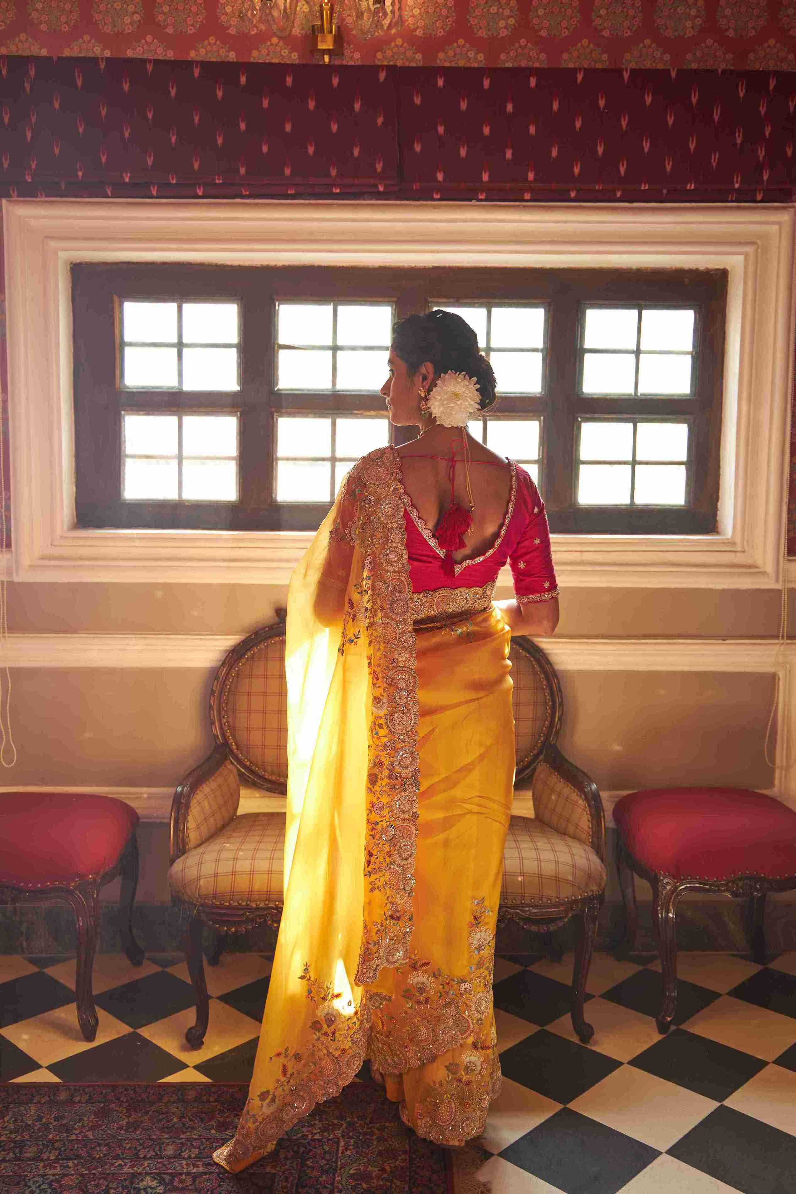 Organza Yellow saree with Zardozi, pearl and sequins work