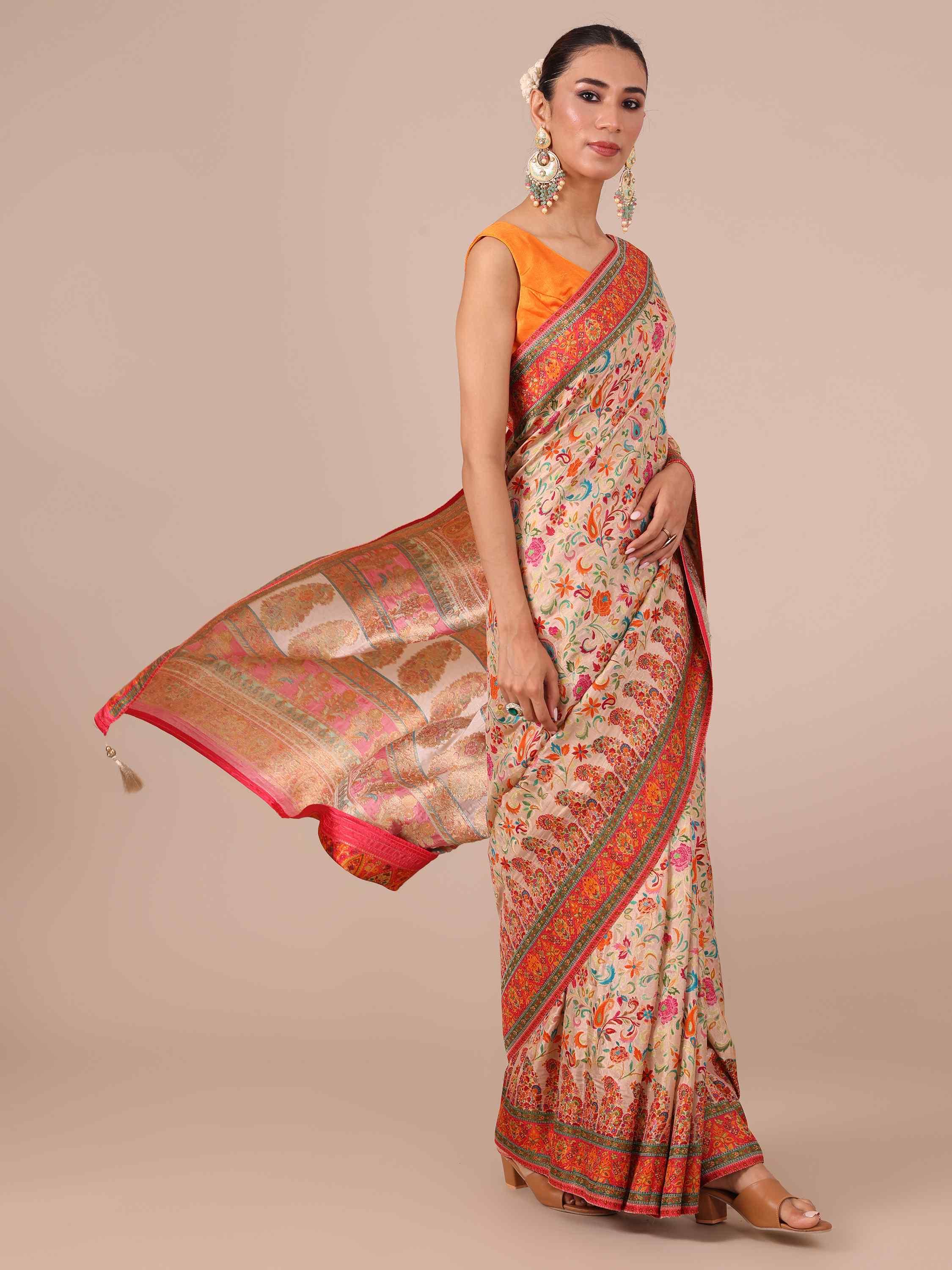 Cream color Silk Saree with Red Unstitched Blouse